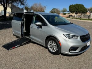 Silver Chrysler Pacifica with Adaptive Vans Side Entry Automatic Fold Out conversion