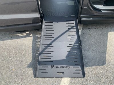 Grey Chrysler Voyager with BraunAbility Side Entry Manual Fold Out conversion