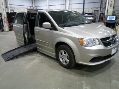 Brown Dodge Grand Caravan with BraunAbility Side Entry Automatic Fold Out conversion