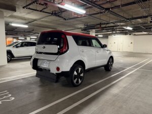White-red Kia Soul with Freedom Motors Rear Entry Automatic Fold Out conversion