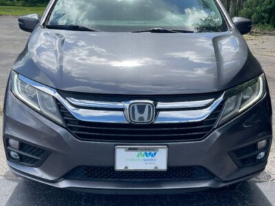 Grey Honda Odyssey with BraunAbility Side Entry Automatic In Floor conversion