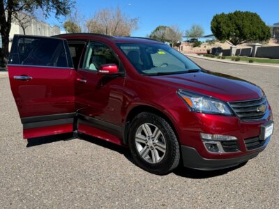 Red Chevrolet Traverse with ATC Side Entry Automatic In Floor conversion