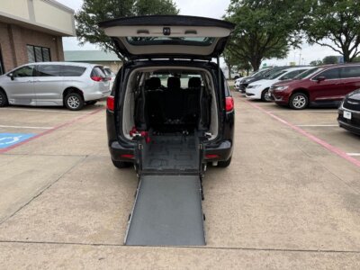 Black Chrysler Voyager with Driverge Rear Entry Manual Fold Out conversion