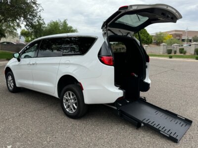 White Chrysler Voyager with FR Conversions Rear Entry Manual Fold Out conversion