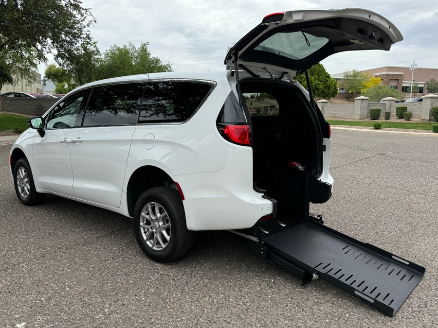 White Chrysler Voyager with FR Conversions Rear Entry Manual Fold Out conversion