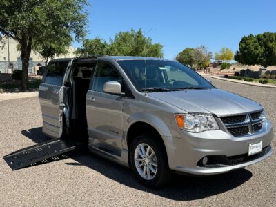 Silver Dodge Grand Caravan with BraunAbility Side Entry Automatic Fold Out conversion
