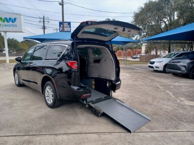 Black Chrysler Pacifica with Driverge Rear Entry Manual Fold Out conversion
