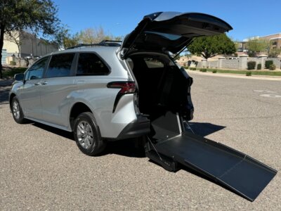 Silver Toyota Sienna with Driverge Rear Entry Manual Fold Out conversion