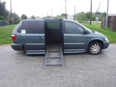 Blue Chrysler Town and Country with BraunAbility Side Entry Automatic Fold Out conversion
