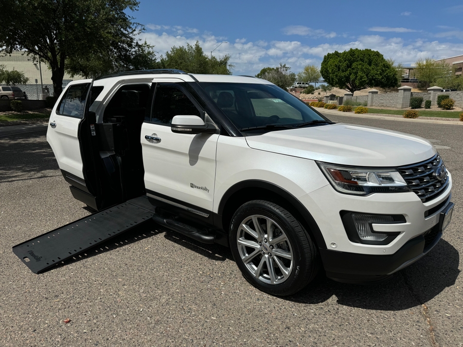 White Ford Explorer with BraunAbility Side Entry Automatic In Floor conversion