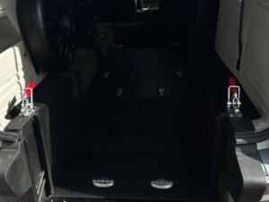 Red Dodge Grand Caravan with International Sales and Mobility Rear Entry Manual Fold Out conversion