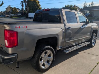 Grey Chevrolet Silverado 1500 with ATC Side Entry Automatic Lift conversion