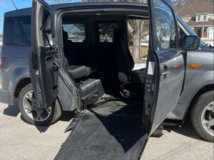 Grey Honda Element with Freedom Motors Side Entry Automatic Fold Out conversion