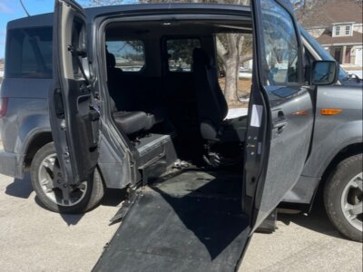 Grey Honda Element with Freedom Motors Side Entry Automatic Fold Out conversion