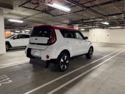 White-red Kia Soul with Freedom Motors Rear Entry Automatic Fold Out conversion