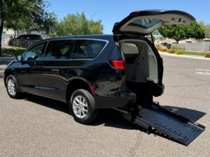 Black Chrysler Voyager with FR Conversions Rear Entry Manual Fold Out conversion