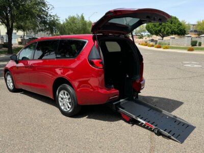 Red Chrysler Pacifica with Adaptive Vans Rear Entry Manual Fold Out conversion