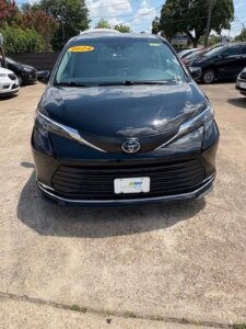 Black Toyota Sienna with Driverge Rear Entry Manual Fold Out conversion