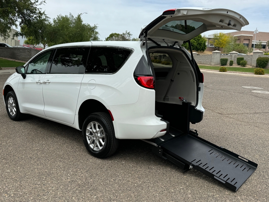 White Chrysler Voyager with FR Conversions Rear Entry Manual Fold Out conversion