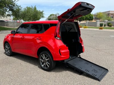 Red Kia Soul with Freedom Motors Rear Entry Automatic Fold Out conversion