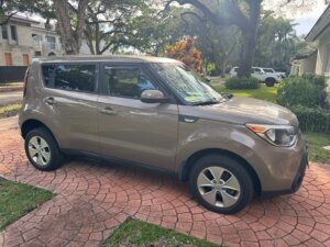 Brown Kia Soul with Freedom Motors Rear Entry Manual Fold Out conversion