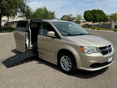Brown Dodge Grand Caravan with BraunAbility Side Entry Automatic Fold Out conversion