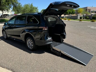 Black Toyota Sienna with Driverge Rear Entry Manual Fold Out conversion