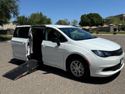 White Chrysler Voyager with Driverge Side Entry Automatic Fold Out conversion