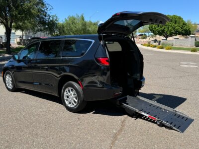 Black Chrysler Pacifica with Adaptive Vans Rear Entry Manual Fold Out conversion