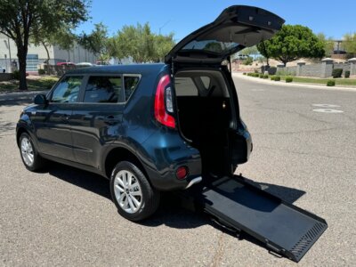 Blue Kia Soul with Freedom Motors Rear Entry Manual Fold Out conversion