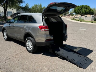 Grey Kia Sorento with Freedom Motors Rear Entry Manual Fold Out conversion