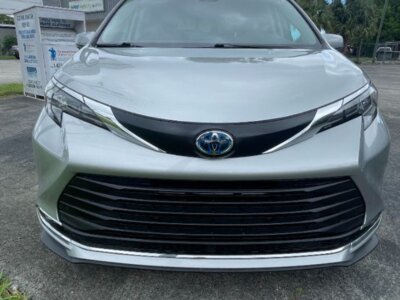 Silver Toyota Sienna with Driverge Rear Entry Manual Fold Out conversion