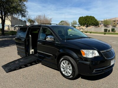Black Chrysler Town and Country with BraunAbility Side Entry Automatic Fold Out conversion
