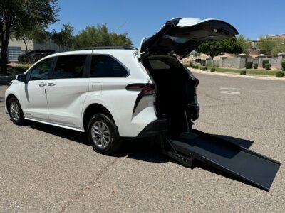 White Toyota Sienna with Driverge Rear Entry Manual Fold Out conversion
