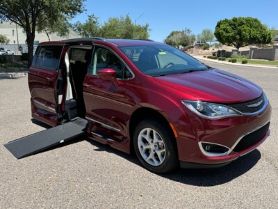 Red Chrysler Pacifica with Vantage Mobility Side Entry Automatic In Floor conversion