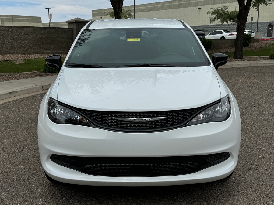 White Chrysler Voyager with FR Conversions Rear Entry Manual Fold Out conversion
