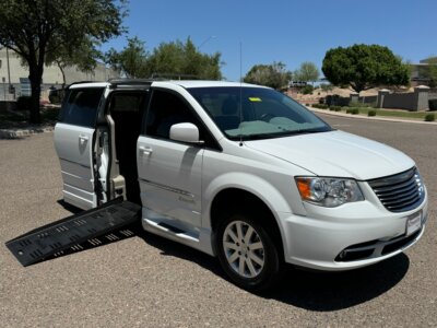 White Chrysler Town and Country with BraunAbility Side Entry Automatic Fold Out conversion