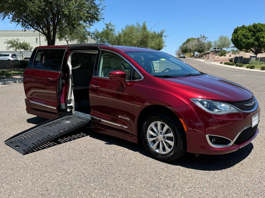 Red Chrysler Pacifica with BraunAbility Side Entry Automatic Fold Out conversion