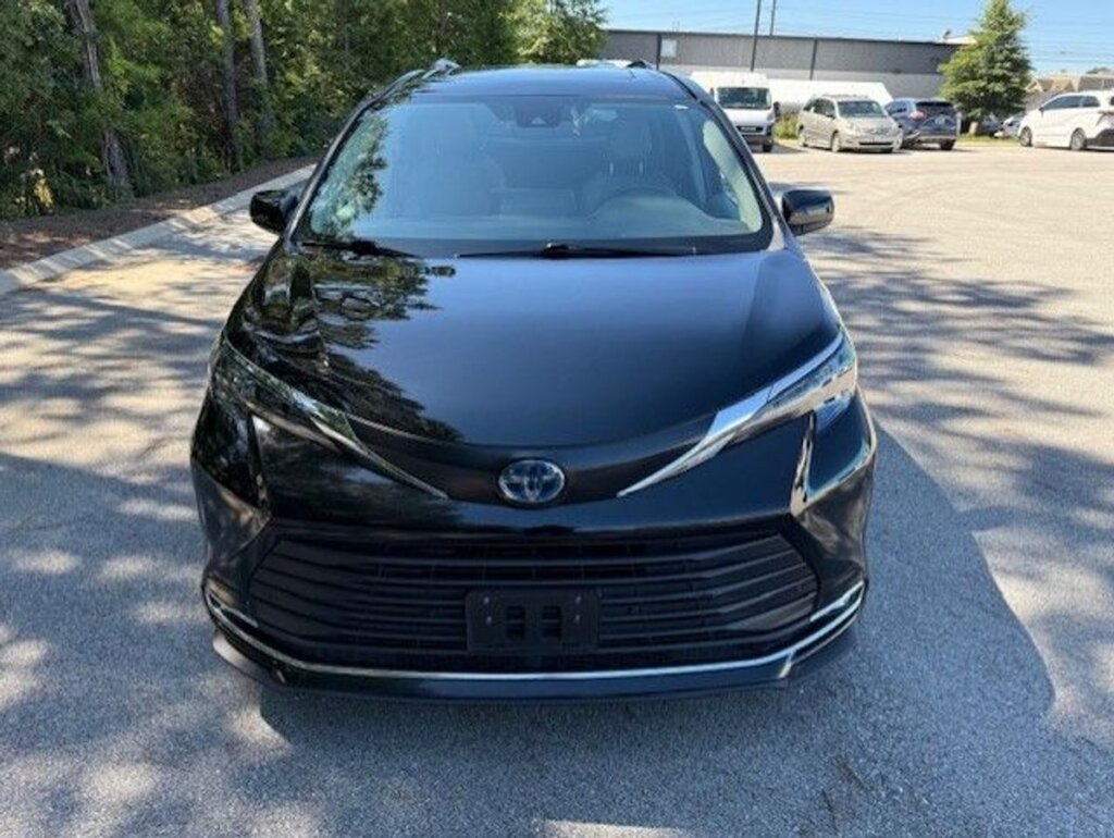 Black Toyota Sienna with Driverge Rear Entry Manual Fold Out conversion