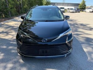 Black Toyota Sienna with Driverge Rear Entry Manual Fold Out conversion