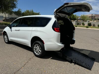 White Chrysler Voyager with FR Conversions Rear Entry Manual Fold Out conversion