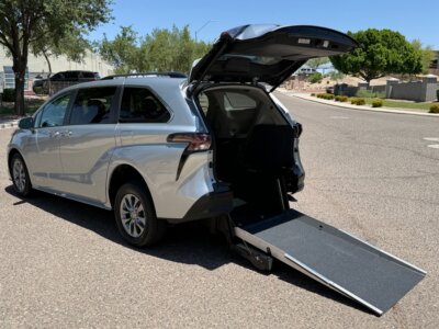 Silver Toyota Sienna with Driverge Rear Entry Manual Fold Out conversion