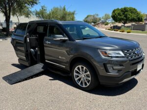 Grey Ford Explorer with BraunAbility Side Entry Automatic In Floor conversion
