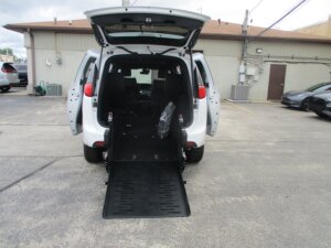 White Chrysler Voyager with FR Conversions Rear Entry Manual Fold Out conversion