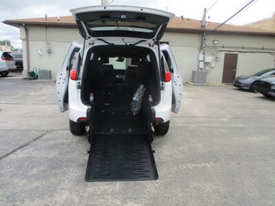 White Chrysler Voyager with FR Conversions Rear Entry Manual Fold Out conversion