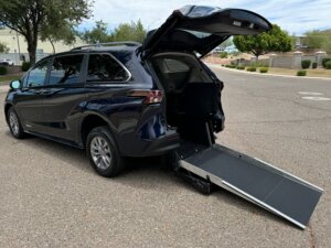 Blue Toyota Sienna with Driverge Rear Entry Manual Fold Out conversion