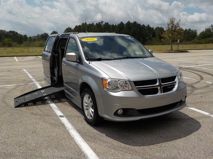 Silver Dodge Grand Caravan with BraunAbility Side Entry Manual Fold Out conversion