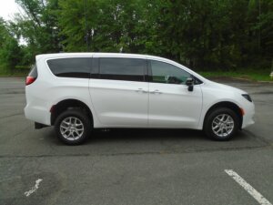 White Chrysler Voyager with FR Conversions Rear Entry Manual Fold Out conversion