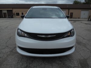 White Chrysler Voyager with FR Conversions Rear Entry Manual Fold Out conversion