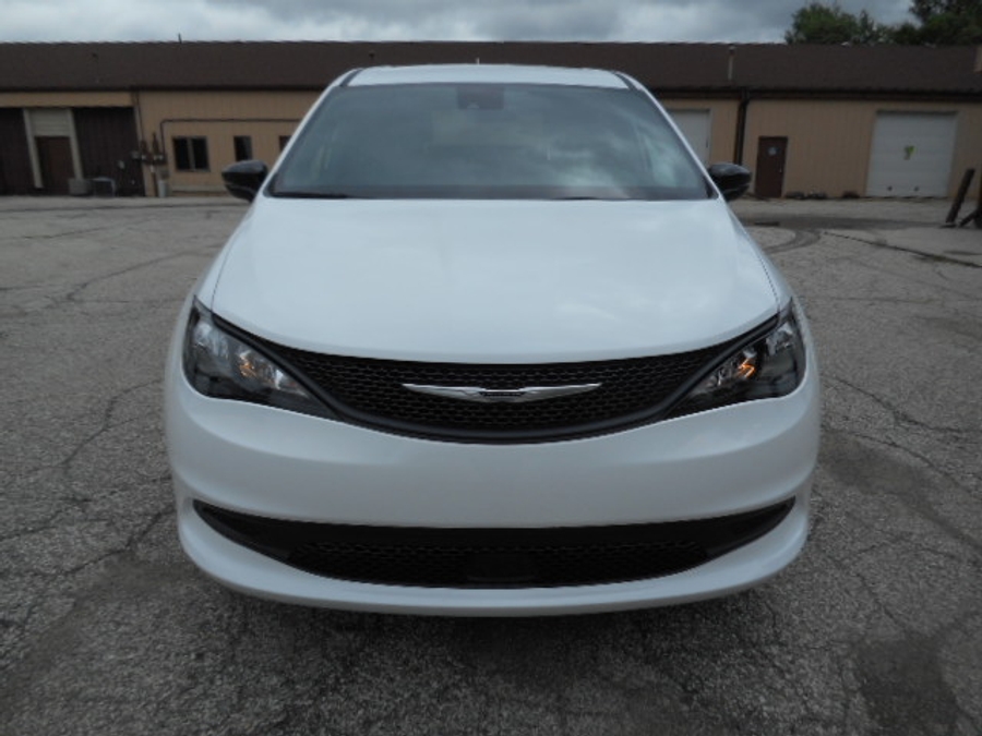 White Chrysler Voyager with FR Conversions Rear Entry Manual Fold Out conversion